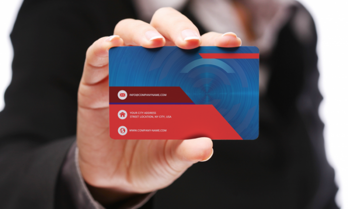 Free Holding Business Card Mock-Up