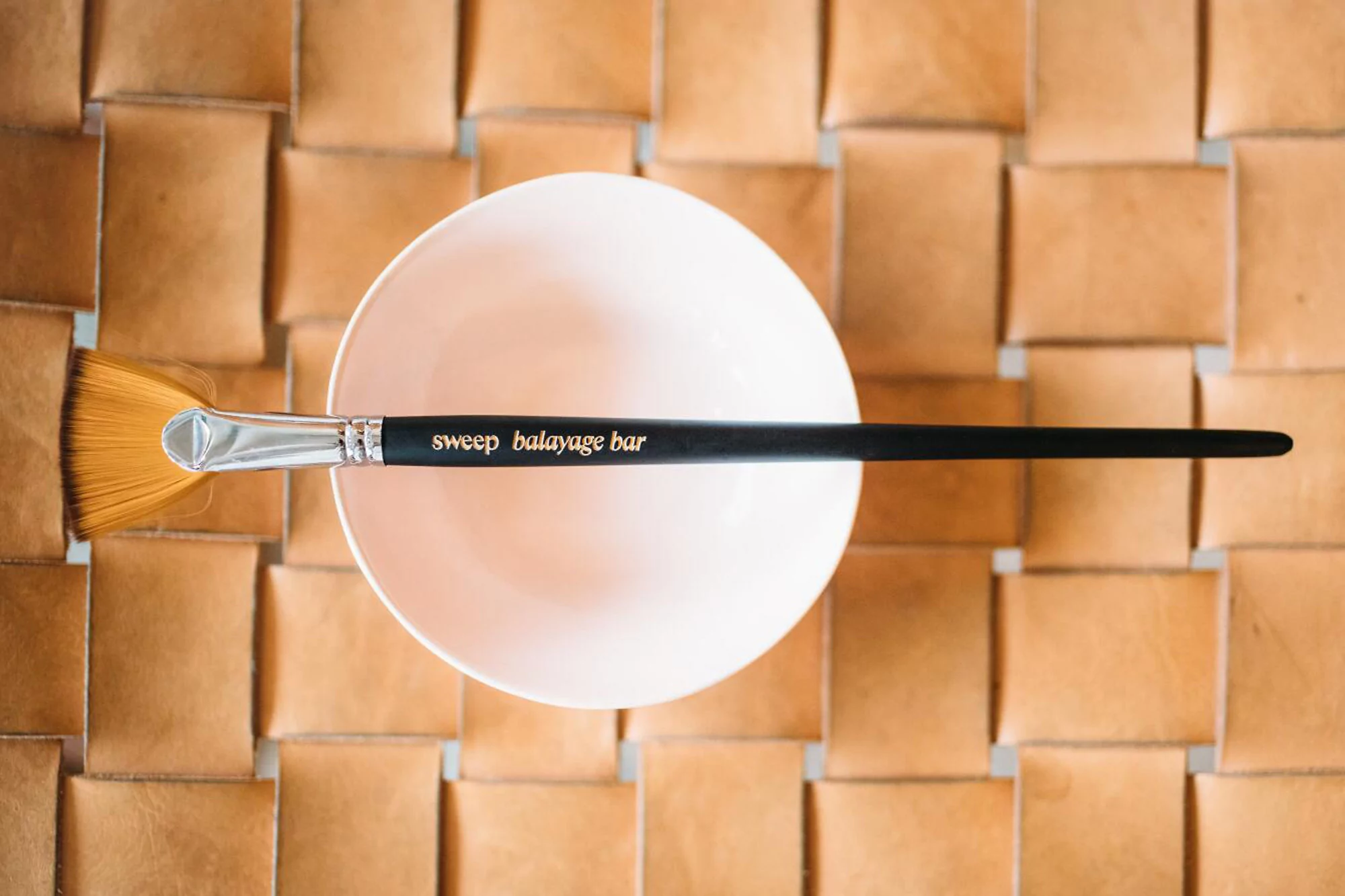 The Office of Ordinary Things’ identity for Sweep reflects the salon’s hand-painted practice
