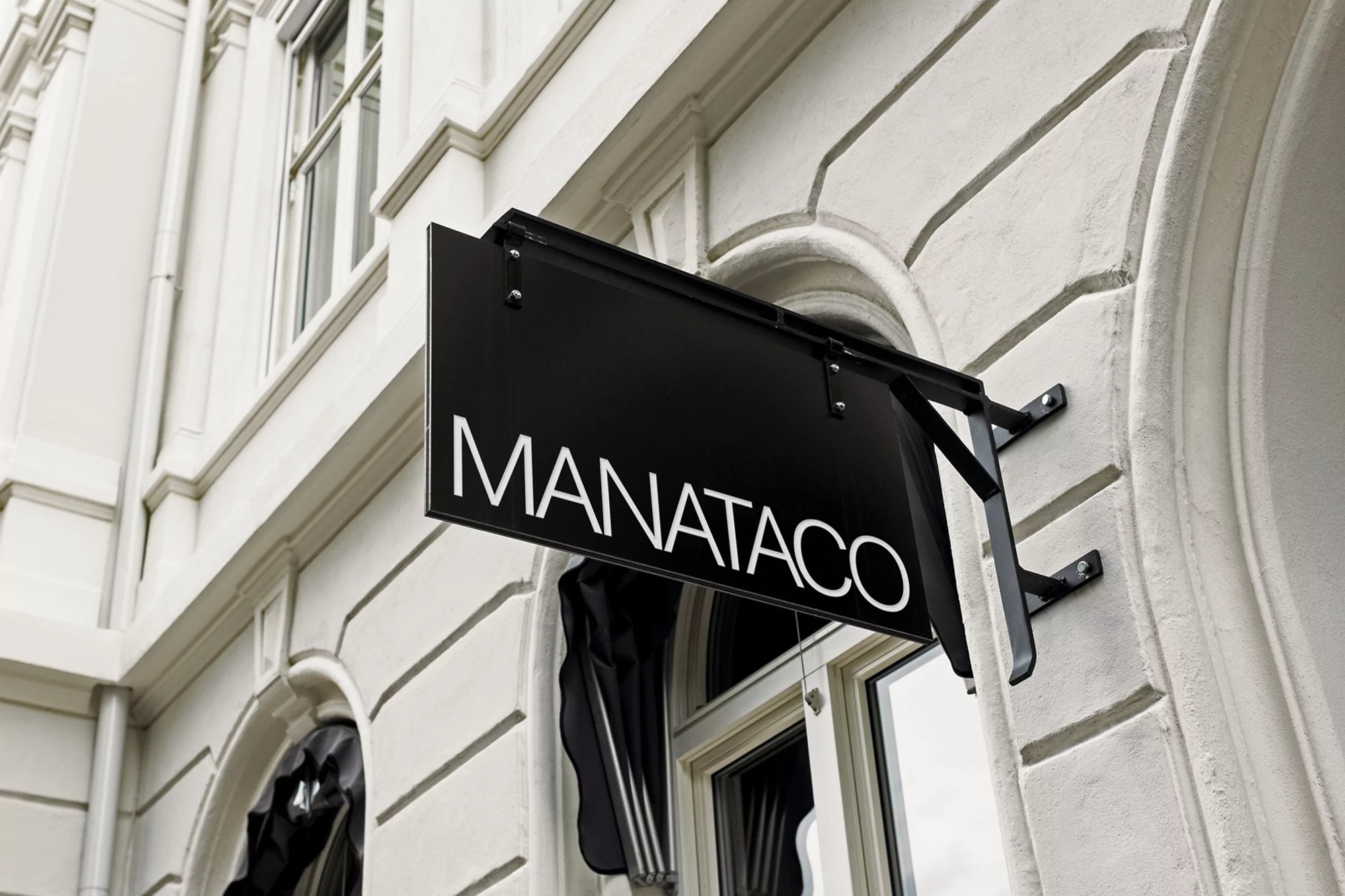 Pentagram's identity for Mexican restaurant Manataco embraces playful typographic wordplay