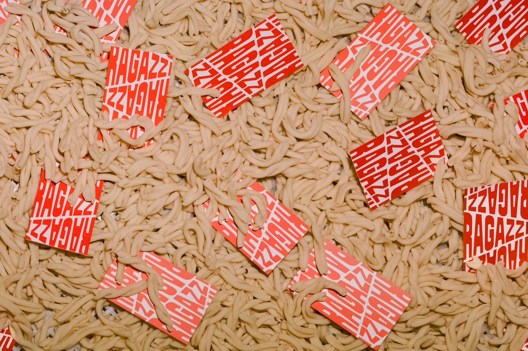 Ragazzi is yelled across the table in SCCO Studio's identity for the Italian eatery