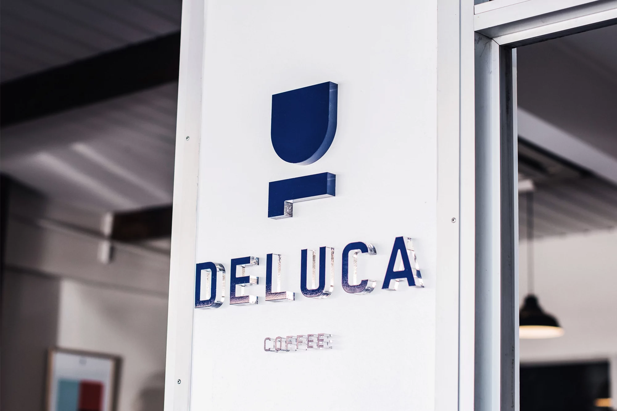 Deluca Coffee by Christopher Doyle & Co.